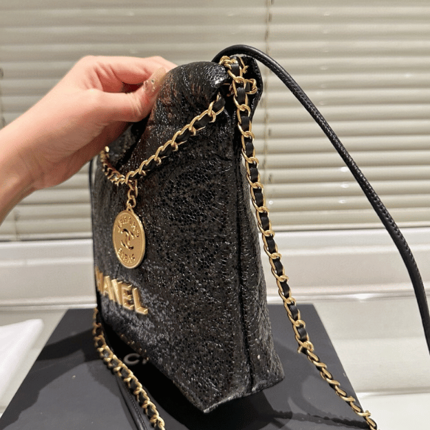 Chanel 22 Sequined Coin Bucket Bag Black 6.7 Inches
